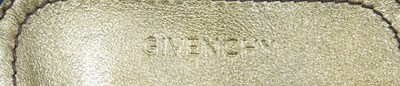 Lot 77 - A Givenchy gold leather hobo bag, of four...