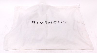 Lot 77 - A Givenchy gold leather hobo bag, of four...