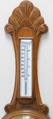 Lot 85 - A Victorian oak cased wheel barometer, with a...