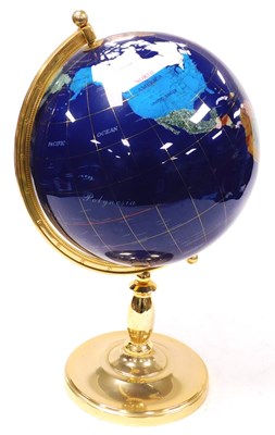 Lot 86 - A hardstone terrestrial globe, in a polished...