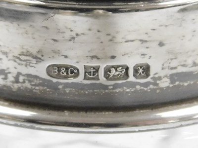 Lot 106 - An Elizabeth II cut glass and silver sugar...