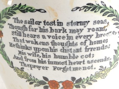 Lot 33 - An early 19thC English porcelain jug, painted...