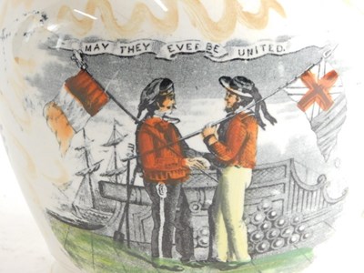 Lot 33 - An early 19thC English porcelain jug, painted...