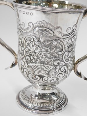 Lot 17 - A George IV silver two handled cup, later...