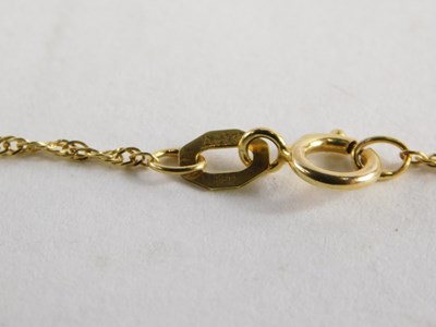 Lot 55 - A 9ct gold amethyst and diamond pendant, with...