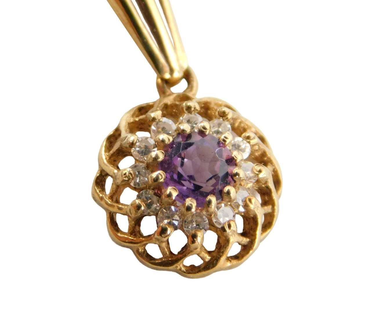 Lot 52 - An amethyst and diamond pendant, in a flower...