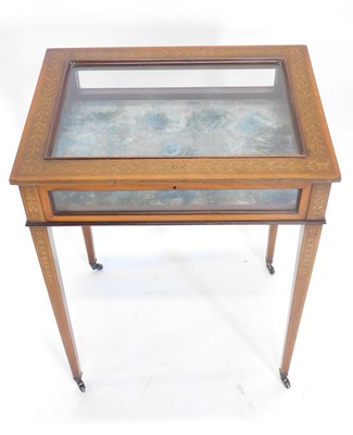 Lot 35 - An Edwardian mahogany marquetry and satinwood...