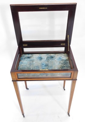 Lot 35 - An Edwardian mahogany marquetry and satinwood...