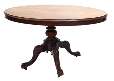 Lot 852 - A Victorian walnut oval breakfast table, with...