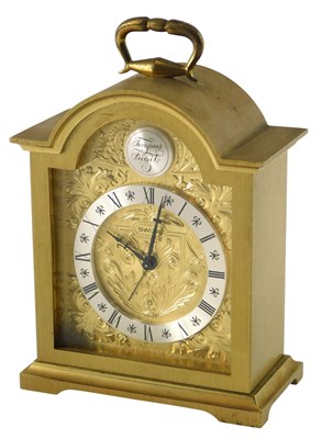 Lot 743 - A Swiza brass carriage timepiece, with scroll...