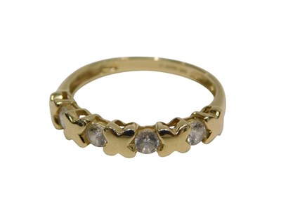 Lot 434 - A QVC CZ and cross half hoop dress ring, set...