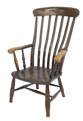 Lot 486 - A 19thC stained elm Grandfather chair, with a...