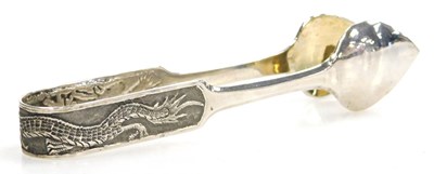 Lot 24 - A pair of early 20thC Chinese sugar tongs,...