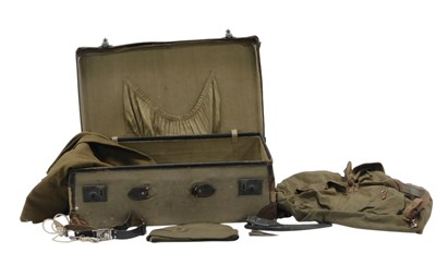 Lot 804 - A canvas and leather bound suitcase, stamped...