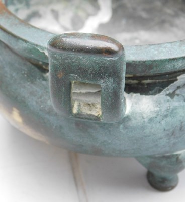 Lot 36 - A Chinese bronze censer, of twin handled,...