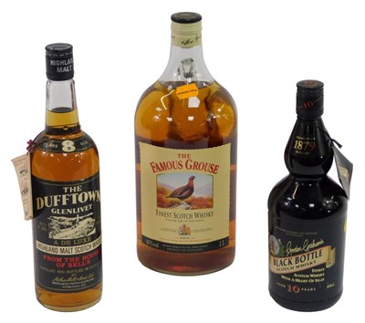 Lot 21 - Three bottles of whisky, comprising The Famous...