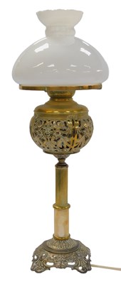 Lot 78 - An early 20thC brass oil lamp, converted to...