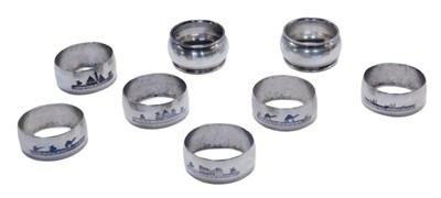 Lot 399 - A pair of George VI silver napkin rings,...