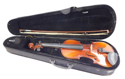 Lot 437 - A 20thC violin, with a two-piece back, bearing...