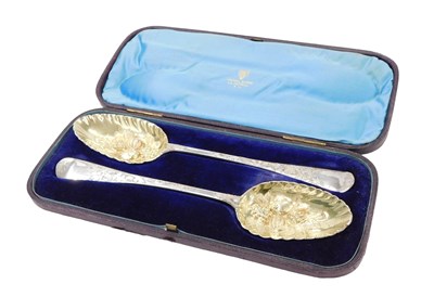 Lot 91 - A pair of Victorian silver berry spoons, with...