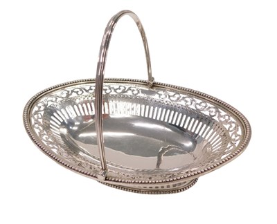 Lot 130 - A Georgian silver oval swing basket, with...