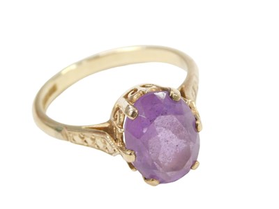 Lot 219 - A 9ct gold amethyst dress ring, set with oval...