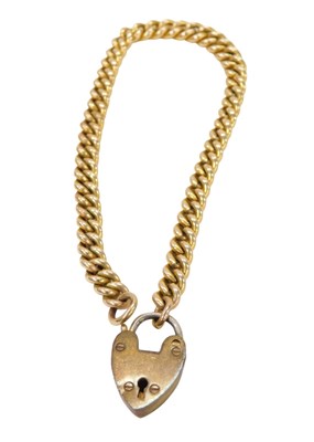 Lot 525 - A curb link bracelet, 18cm long, with a plated...