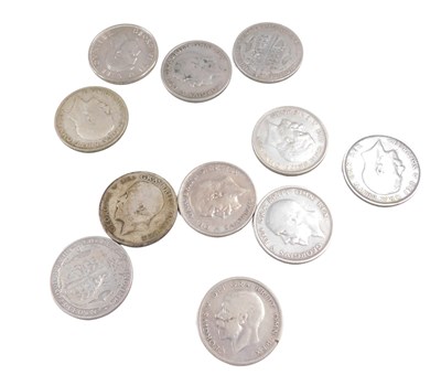 Lot 606 - Eleven pre 1946 half crowns, 153.5g all in.