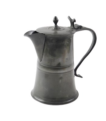 Lot 509 - A 19thC pewter lidded flagon, with moulded...