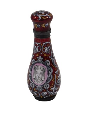 Lot 543 - A European enamel scent bottle, on a red...