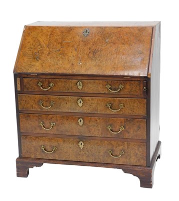 Lot 1034 - A mid 18thC walnut and burr walnut bureau, the...