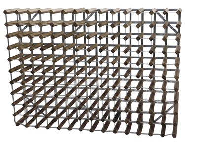 Lot 973 - A pine and galvanised metal wine rack, label...