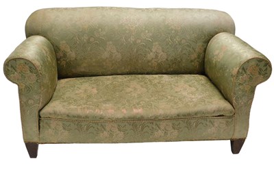 Lot 1033 - An Edwardian mahogany drop arm sofa,...