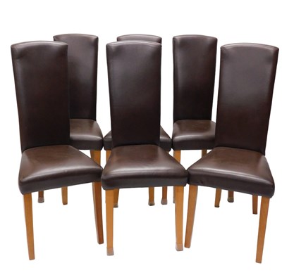 Lot 976 - A set of six brown leather and beech highback...