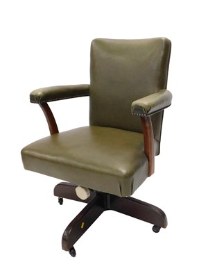Lot 979 - A mid-20thC mahogany office chair, with green...