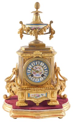 Lot 7 - A 19thC French gilt metal and porcelain mantel...