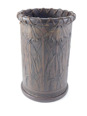 Lot 9 - An Art Nouveau embossed umbrella stand, with...