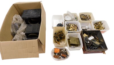 Lot 407 - A quantity of clock movements, faces, and...