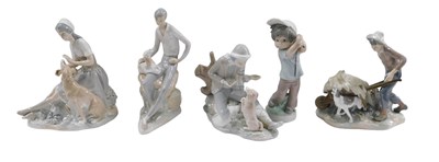 Lot 473 - Five Spanish porcelain figures, comprising a...