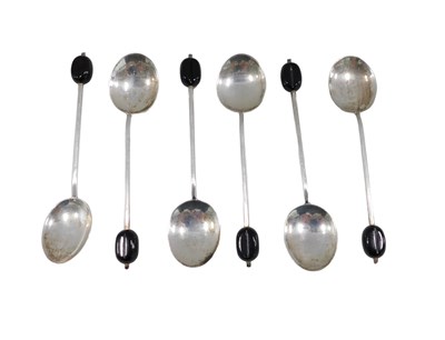 Lot 676 - A set of six George VI silver coffee bean...