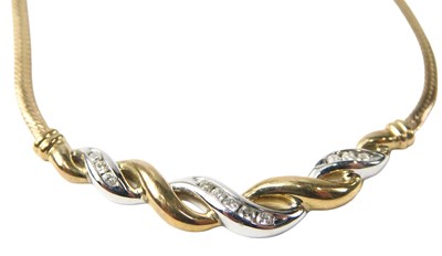 Lot 555 - A bicolour pendant, set with CZs, in crossover...