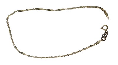 Lot 556 - A 9ct gold fine link anklet, 23cm long, 1.3g.