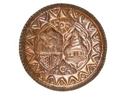 Lot 951 - A decorative embossed wall plaque, decorated...