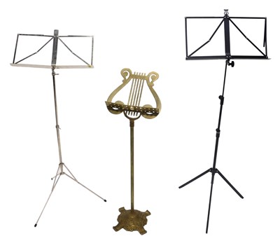 Lot 911 - A brass music stand, with lyre shaped rest,...
