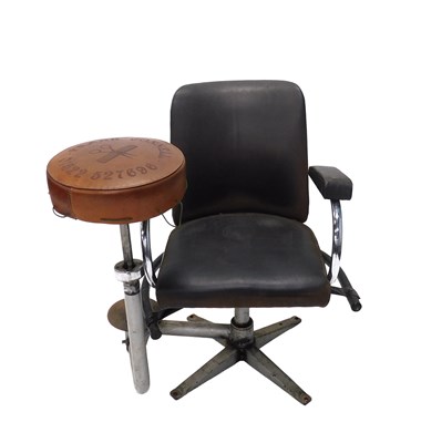 Lot 658 - A vintage brown leather and tubular metal...