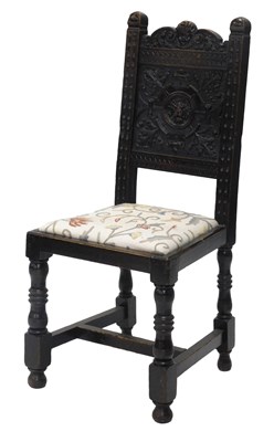 Lot 656 - A 19thC oak side chair, the tall back carved...