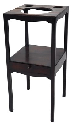 Lot 655 - A 19thC mahogany washstand, the square top...