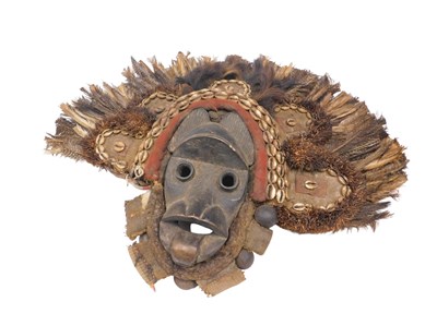 Lot 202 - A Dan tribal lion mask, Ivory Coast, 54cm high.