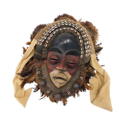 Lot 204 - A Dan Deangle tribal mask, Ivory Coast, 54cm...