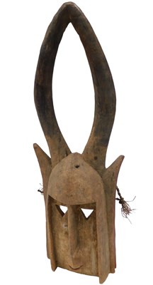 Lot 207 - A Dogon tribal mask, Mali, 67cm high.